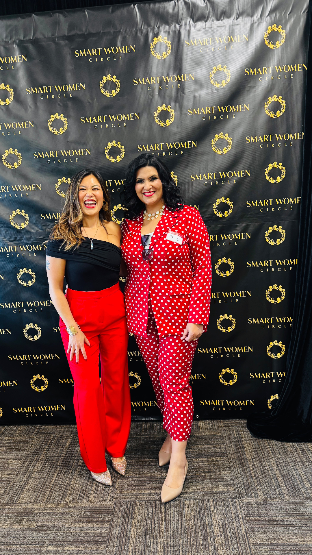 A joyful moment between women at a Smart Women Circle event